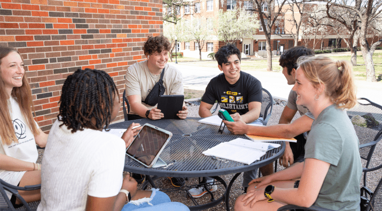 students outside hanging out